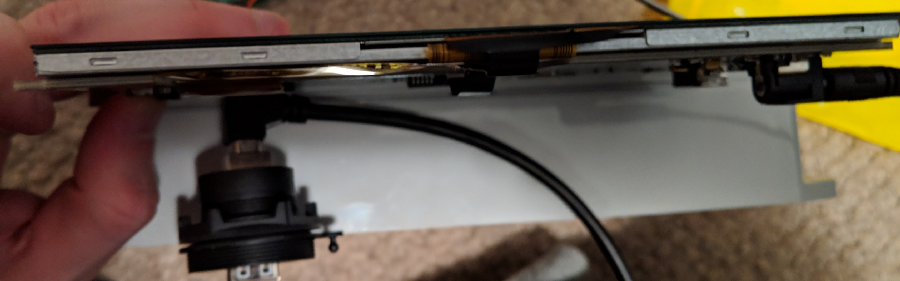 A test fit of the USB connector, USB cable, and display held up in front of the case