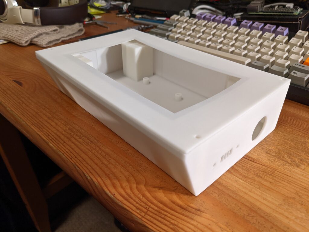 A 3-D printed case sitting on a desk